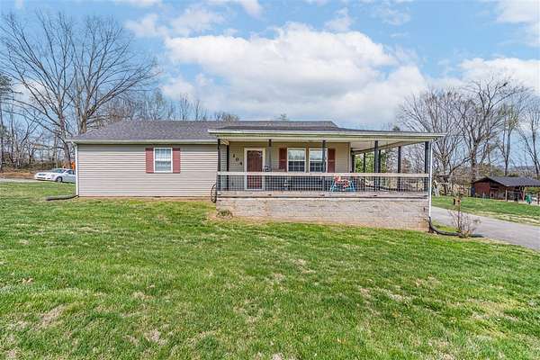 1.65 Acres of Land with Home for Sale in Scottsville, Kentucky