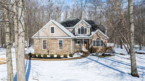 1.66 Acres of Land with Home for Sale in Leroy Township, Ohio