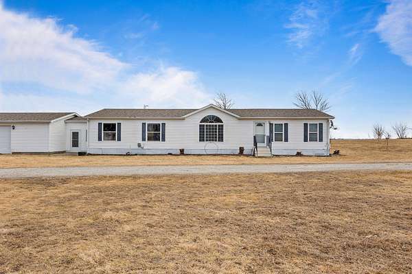 4.7 Acres of Land with Home for Sale in Minburn, Iowa