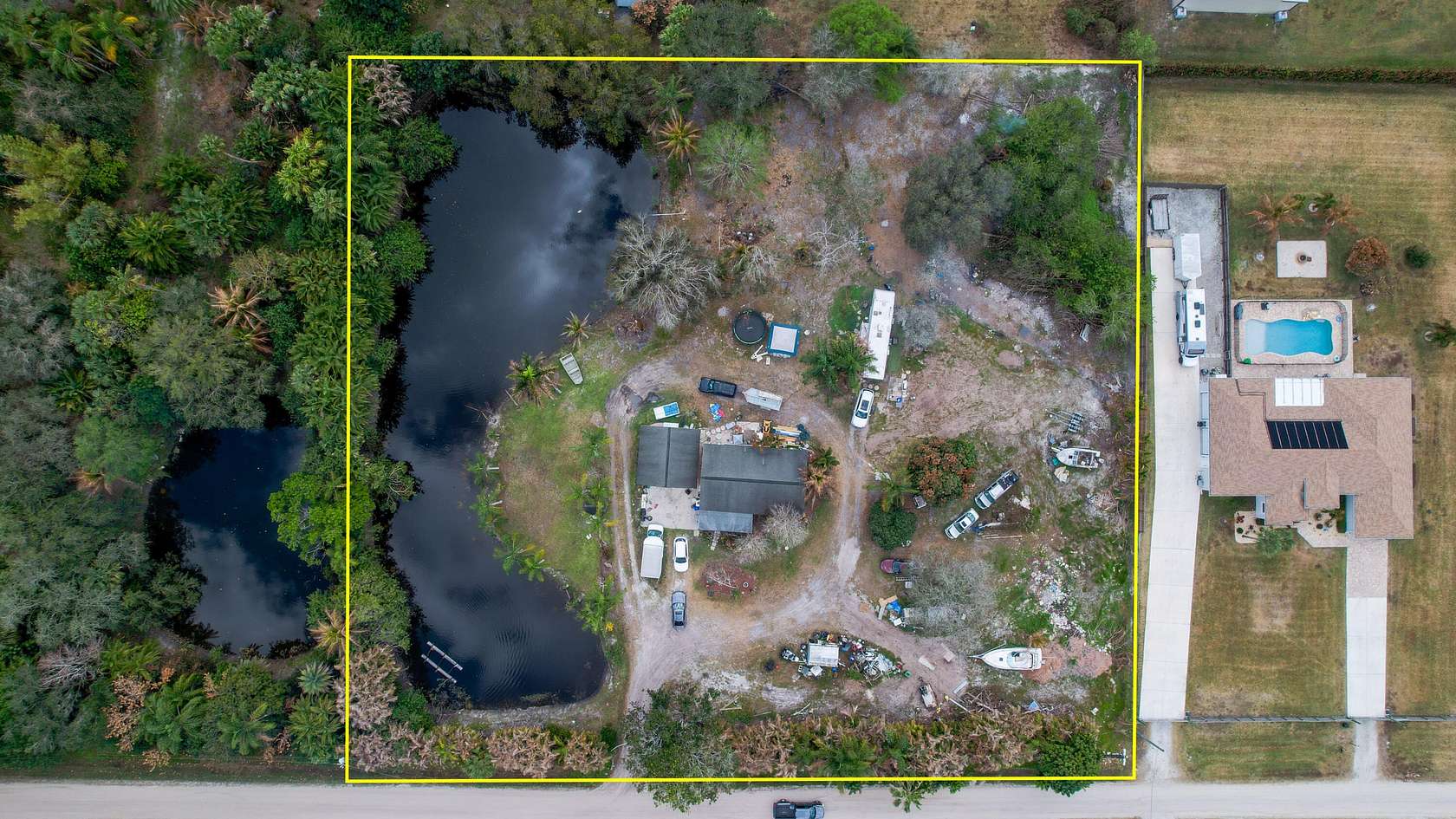 2.5 Acres of Land with Home for Sale in Jupiter, Florida