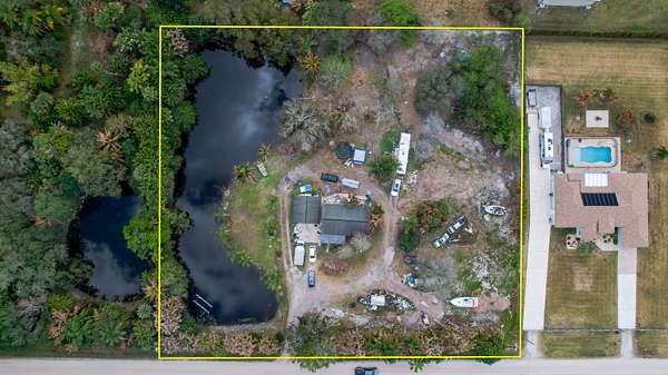 2.5 Acres of Land with Home for Sale in Jupiter, Florida
