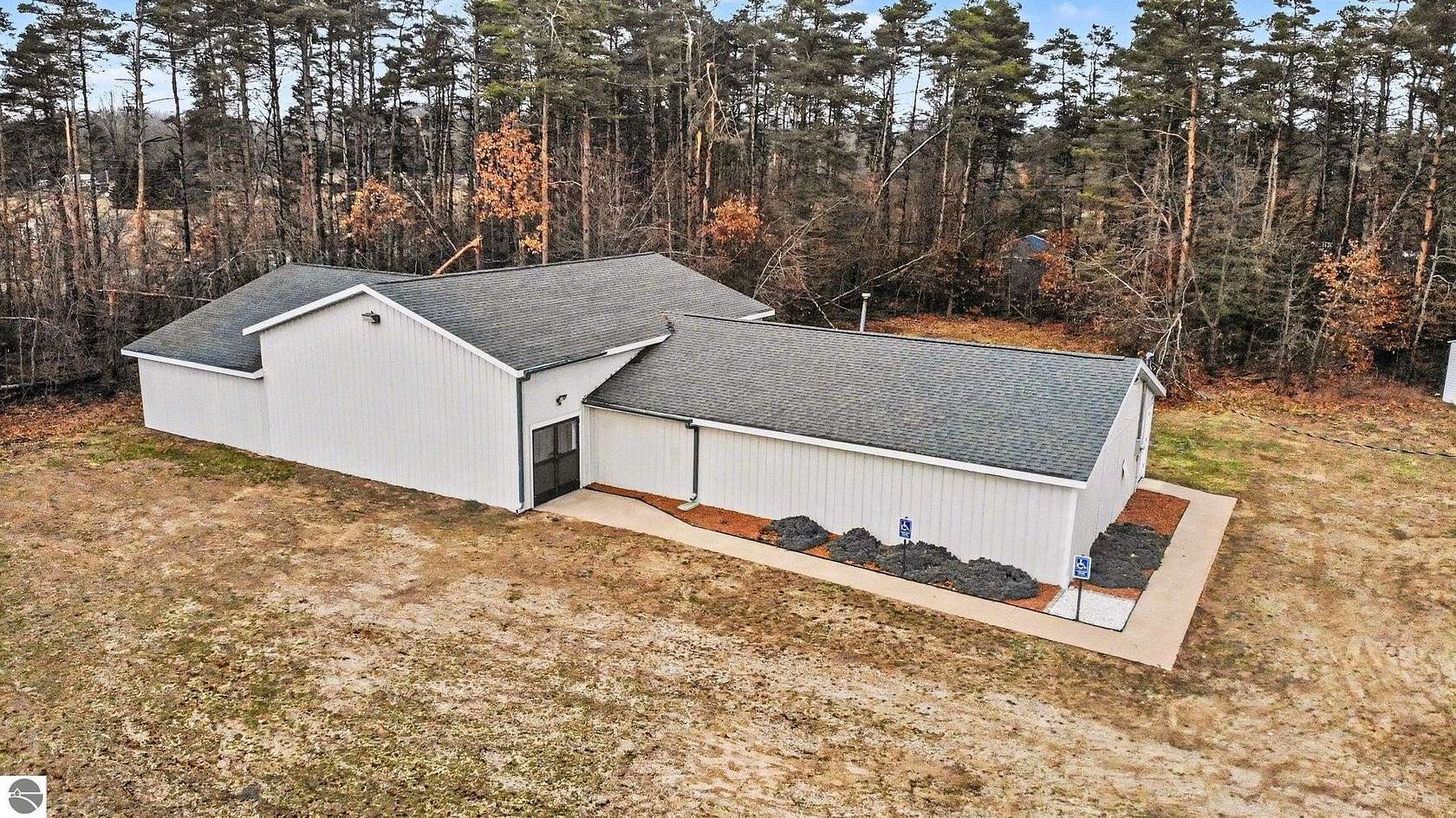 2.15 Acres of Improved Commercial Land for Sale in Weidman, Michigan