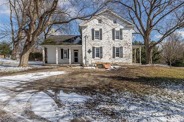 5 Acres of Land with Home for Sale in Louisville, Ohio