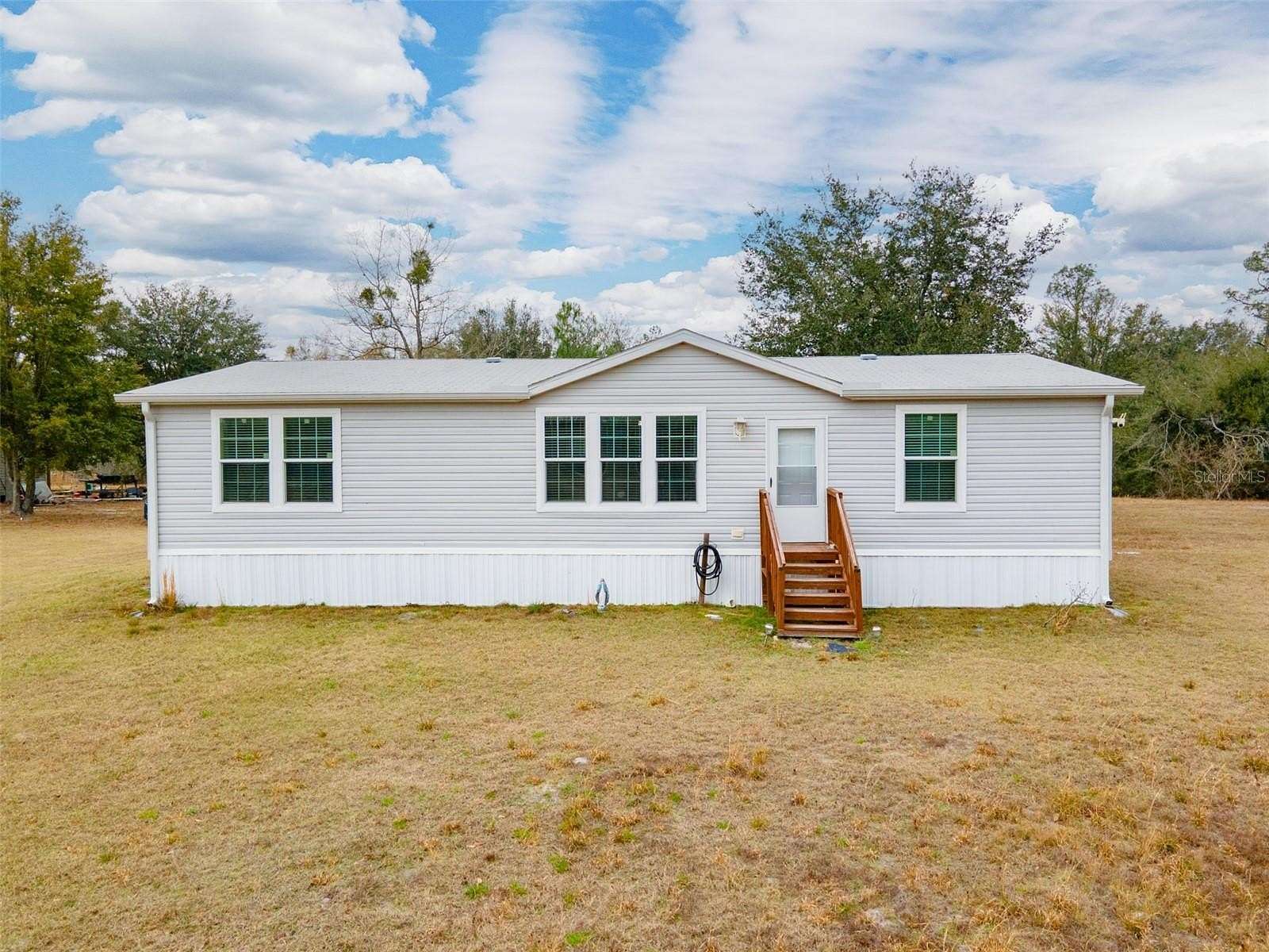 9.12 Acres of Land with Home for Sale in Live Oak, Florida