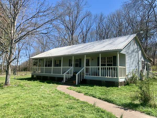 13.9 Acres of Land with Home for Sale in Ardmore, Tennessee