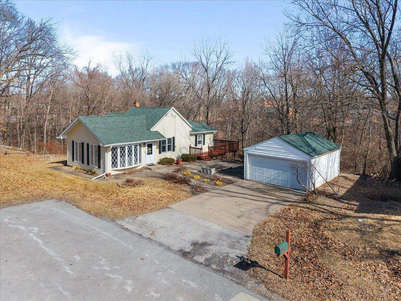 4.37 Acres of Land with Home for Sale in Moline, Illinois