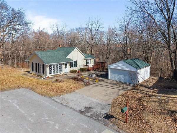 4.37 Acres of Land with Home for Sale in Moline, Illinois
