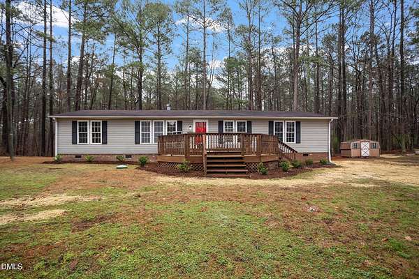 1.56 Acres of Land with Home for Sale in New Hill, North Carolina