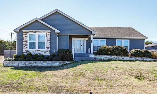 11.8 Acres of Recreational Land with Home for Sale in Royse City, Texas
