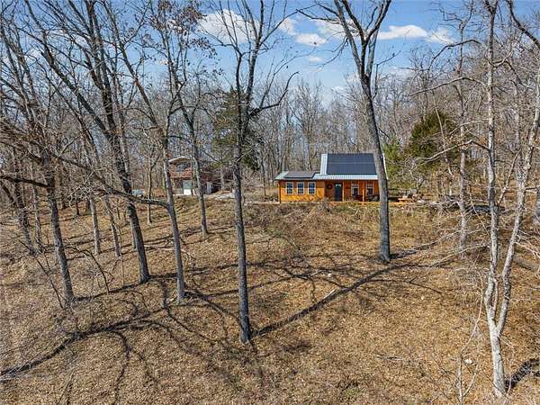 6.5 Acres of Land with Home for Sale in Neosho, Missouri