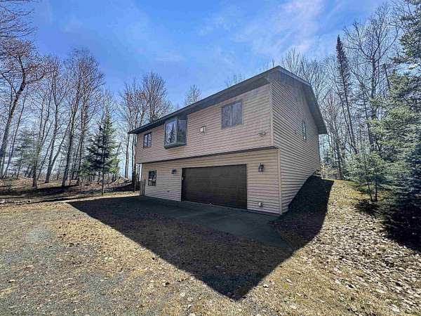 5.89 Acres of Land with Home for Sale in Crystal Falls, Michigan