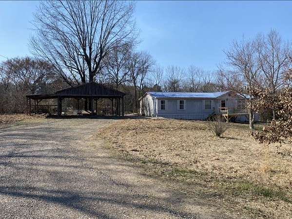 3.79 Acres of Land with Home for Sale in Lamar, Arkansas