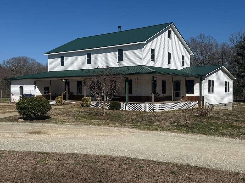 29.2 Acres of Agricultural Land with Home for Sale in McKenzie, Tennessee