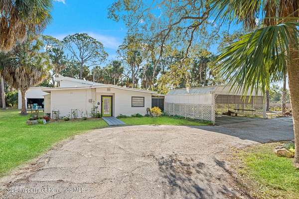 4.9 Acres of Land with Home for Sale in Hernando Beach, Florida