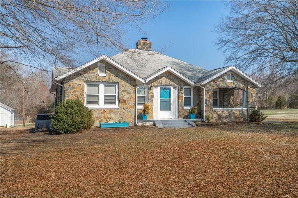 11.2 Acres of Land with Home for Sale in Gibsonville, North Carolina