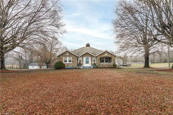 11.2 Acres of Land with Home for Sale in Gibsonville, North Carolina