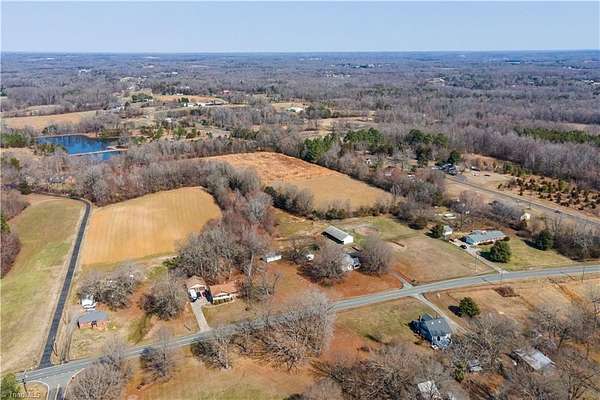 11.2 Acres of Land with Home for Sale in Gibsonville, North Carolina