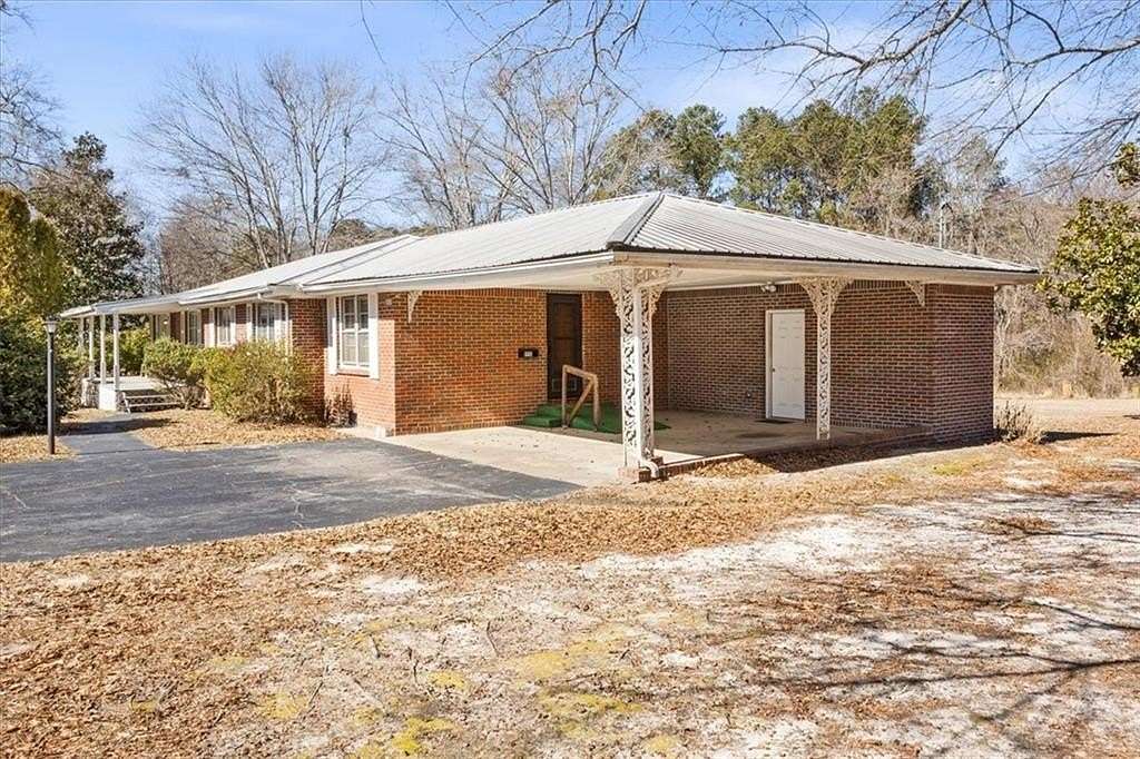 6.84 Acres of Land with Home for Sale in Villa Rica, Georgia