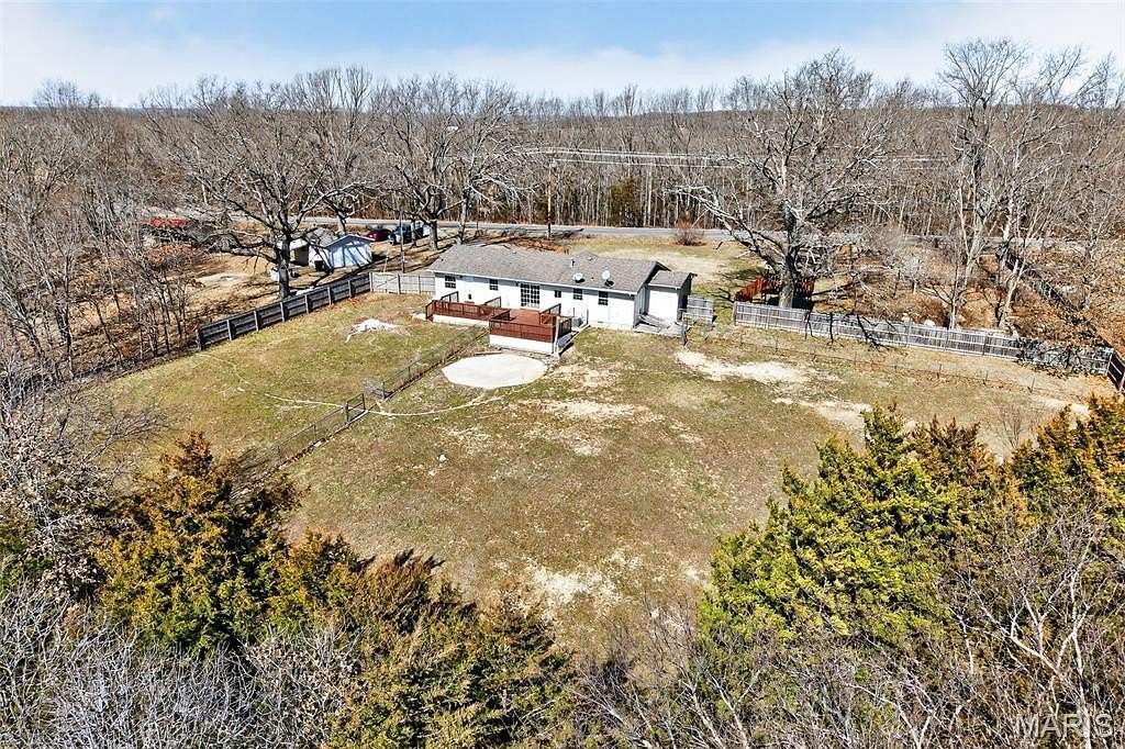 40.5 Acres of Agricultural Land with Home for Sale in Lebanon, Missouri