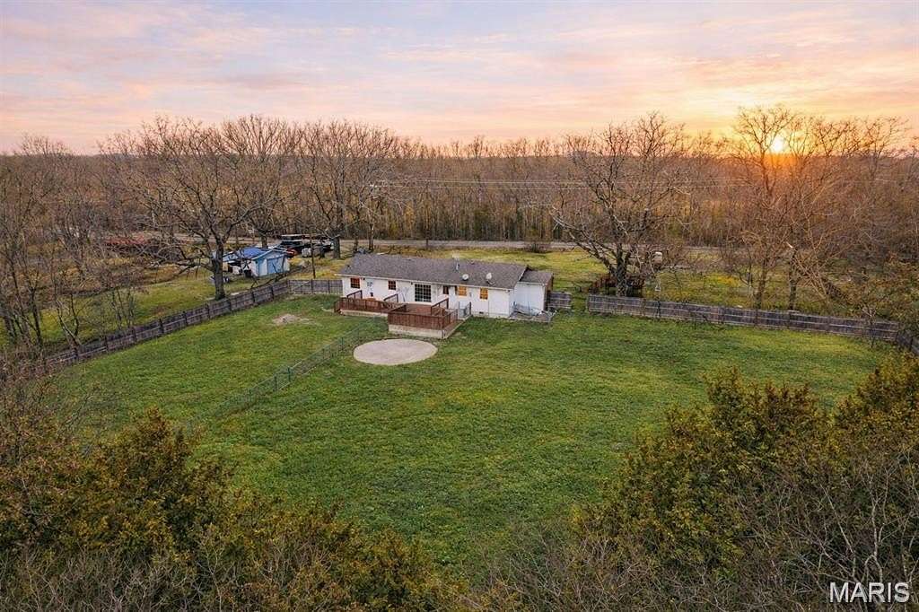 40.5 Acres of Agricultural Land with Home for Sale in Lebanon, Missouri