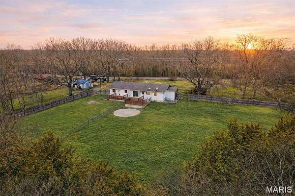 40.5 Acres of Agricultural Land with Home for Sale in Lebanon, Missouri