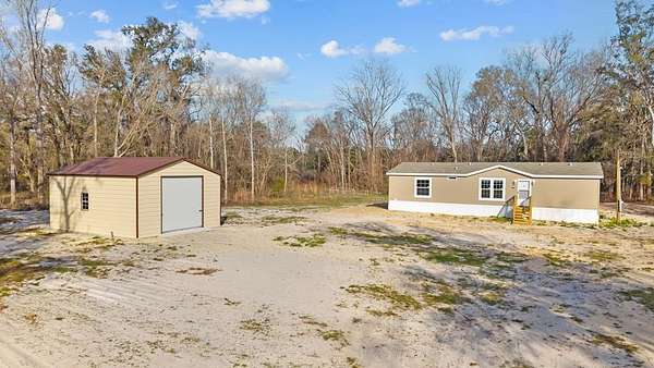 9 Acres of Land with Home for Sale in Cross City, Florida