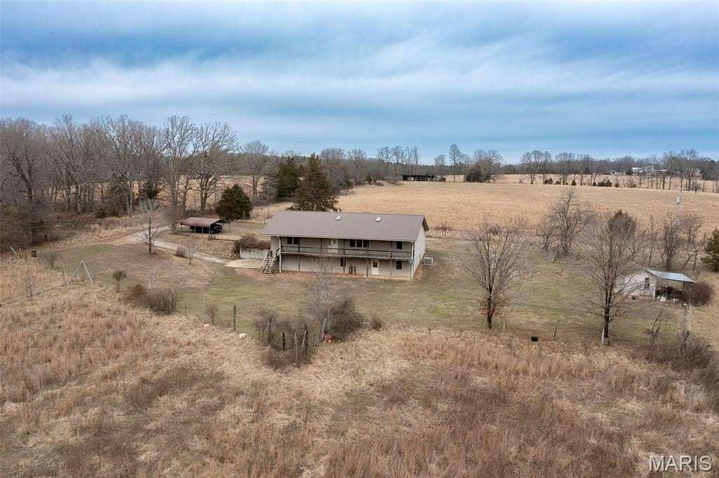 56.8 Acres of Land with Home for Sale in Fremont, Missouri