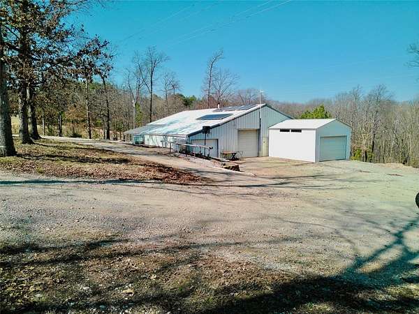 5.8 Acres of Land with Home for Sale in Pineville, Missouri