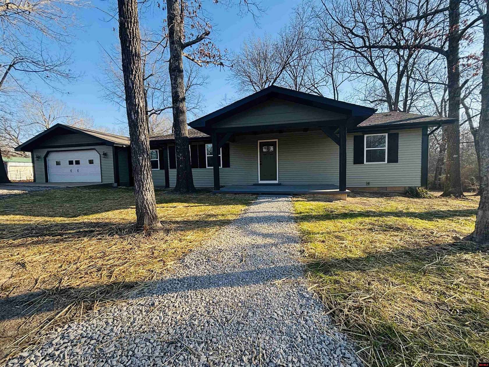 1.57 Acres of Land with Home for Sale in Flippin, Arkansas