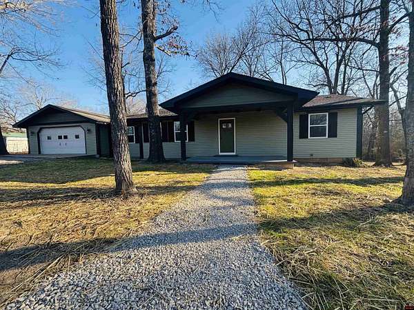 1.57 Acres of Land with Home for Sale in Flippin, Arkansas