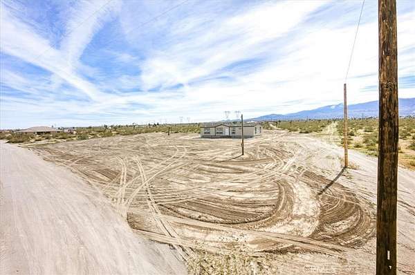 7.76 Acres of Land with Home for Sale in Phelan, California