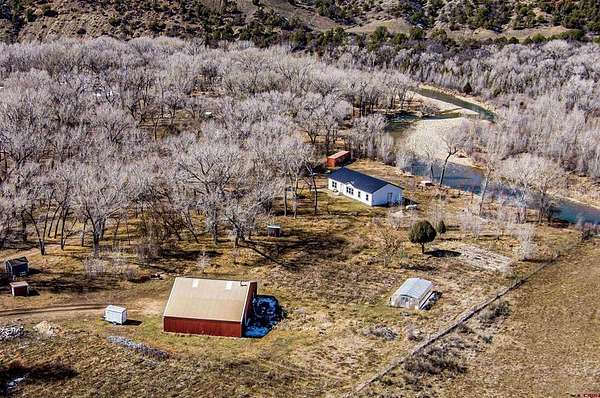 5 Acres of Land with Home for Sale in Pagosa Springs, Colorado