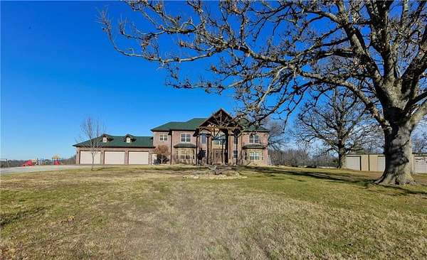 320 Acres of Land with Home for Sale in Reeds Spring, Missouri