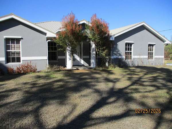 4.76 Acres of Land with Home for Sale in Okeechobee, Florida