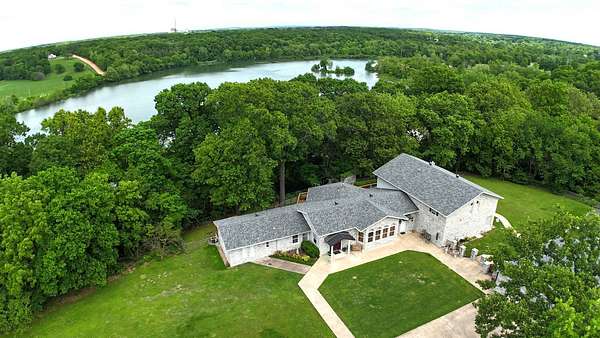 5.63 Acres of Land with Home for Sale in Siloam Springs, Arkansas