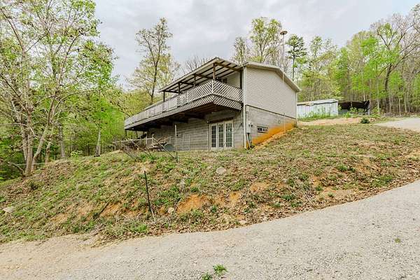 6.39 Acres of Land with Home for Sale in Speedwell, Tennessee