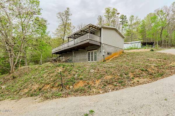 6.39 Acres of Land with Home for Sale in Speedwell, Tennessee