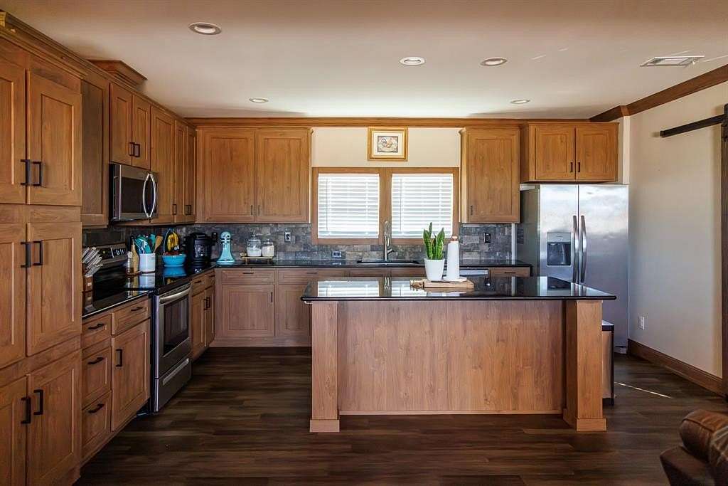 10 Acres of Land with Home for Sale in Merkel, Texas