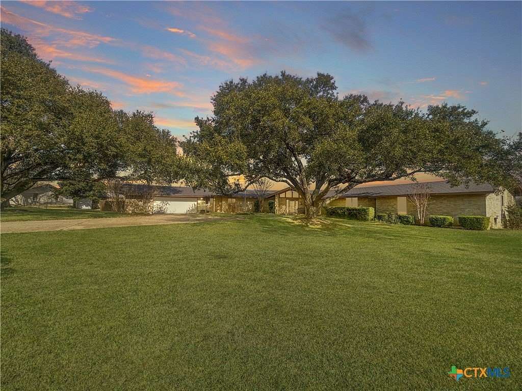 9.77 Acres of Land with Home for Sale in Cameron, Texas