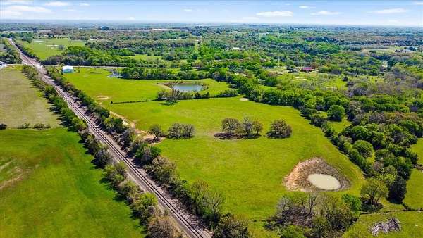 25 Acres of Land with Home for Sale in Cleburne, Texas