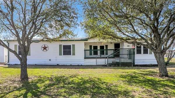 2.18 Acres of Land with Home for Sale in Quinlan, Texas