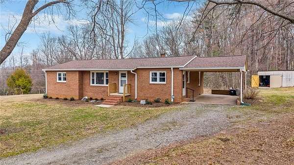 3.88 Acres of Land with Home for Sale in Moravian Falls, North Carolina