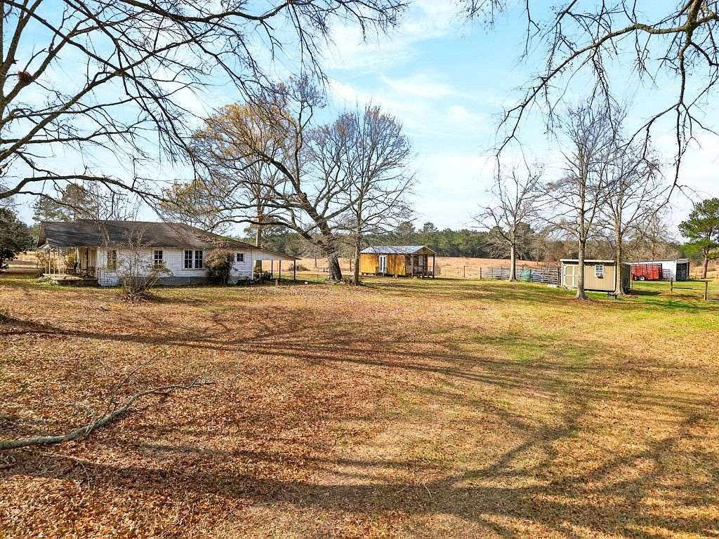 28.5 Acres of Land with Home for Sale in Sandy Hook, Mississippi