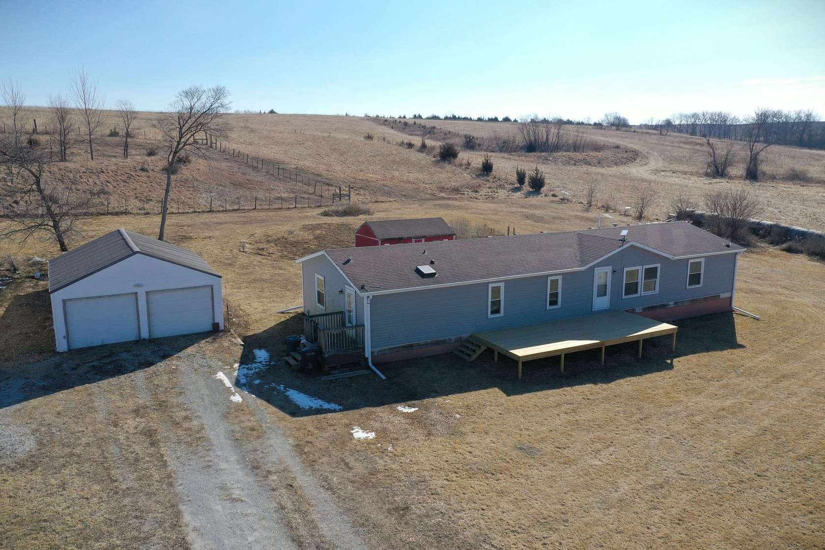 10 Acres of Recreational Land with Home for Sale in Lacona, Iowa