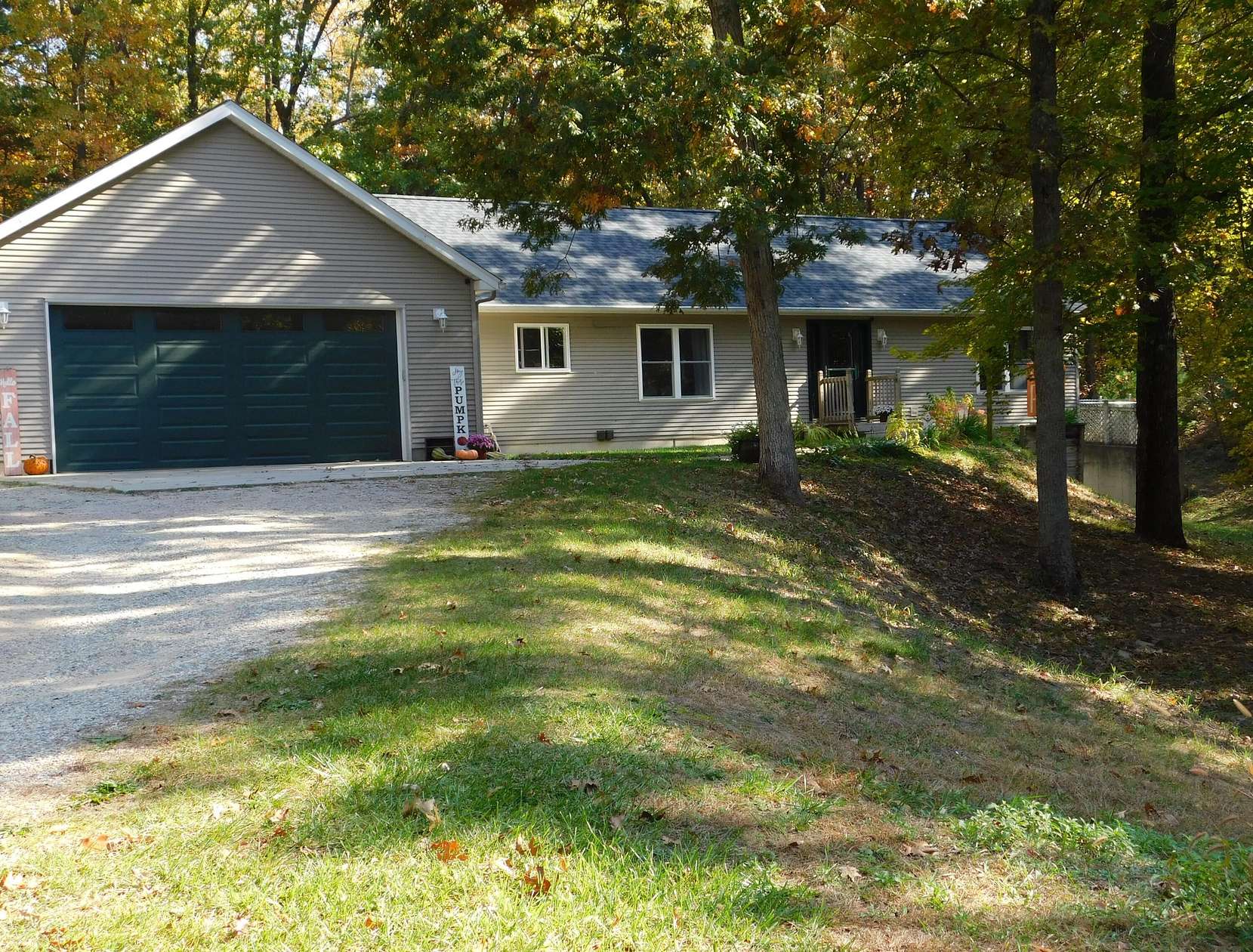 3 Acres of Land with Home for Sale in Cedar Springs, Michigan