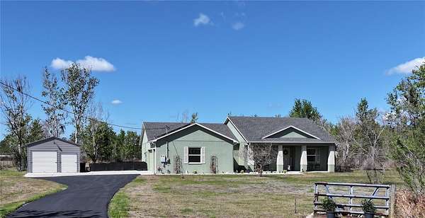 3 Acres of Land with Home for Sale in Polk City, Florida