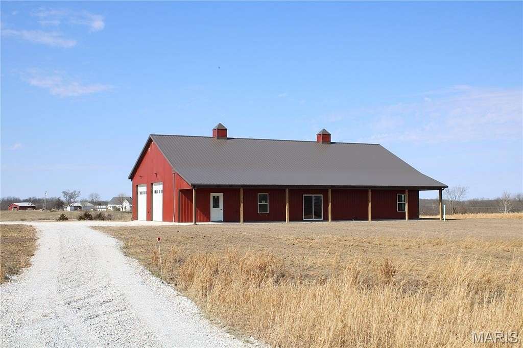 7.5 Acres of Land with Home for Sale in Santa Fe, Missouri