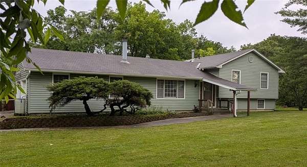 5 Acres of Land with Home for Sale in Harrisonville, Missouri