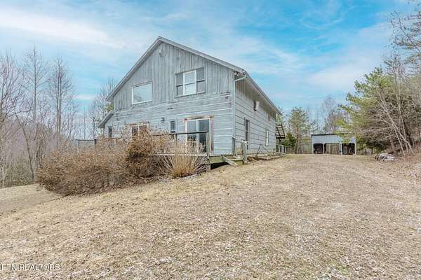 8.7 Acres of Land with Home for Sale in Del Rio, Tennessee