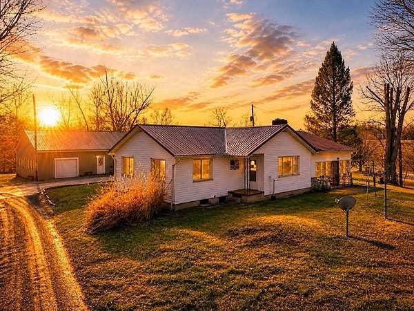 16.4 Acres of Land with Home for Sale in Rockbridge, Ohio